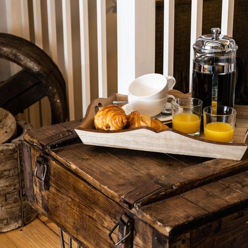 Tray on chair in room at Forss House hotel 