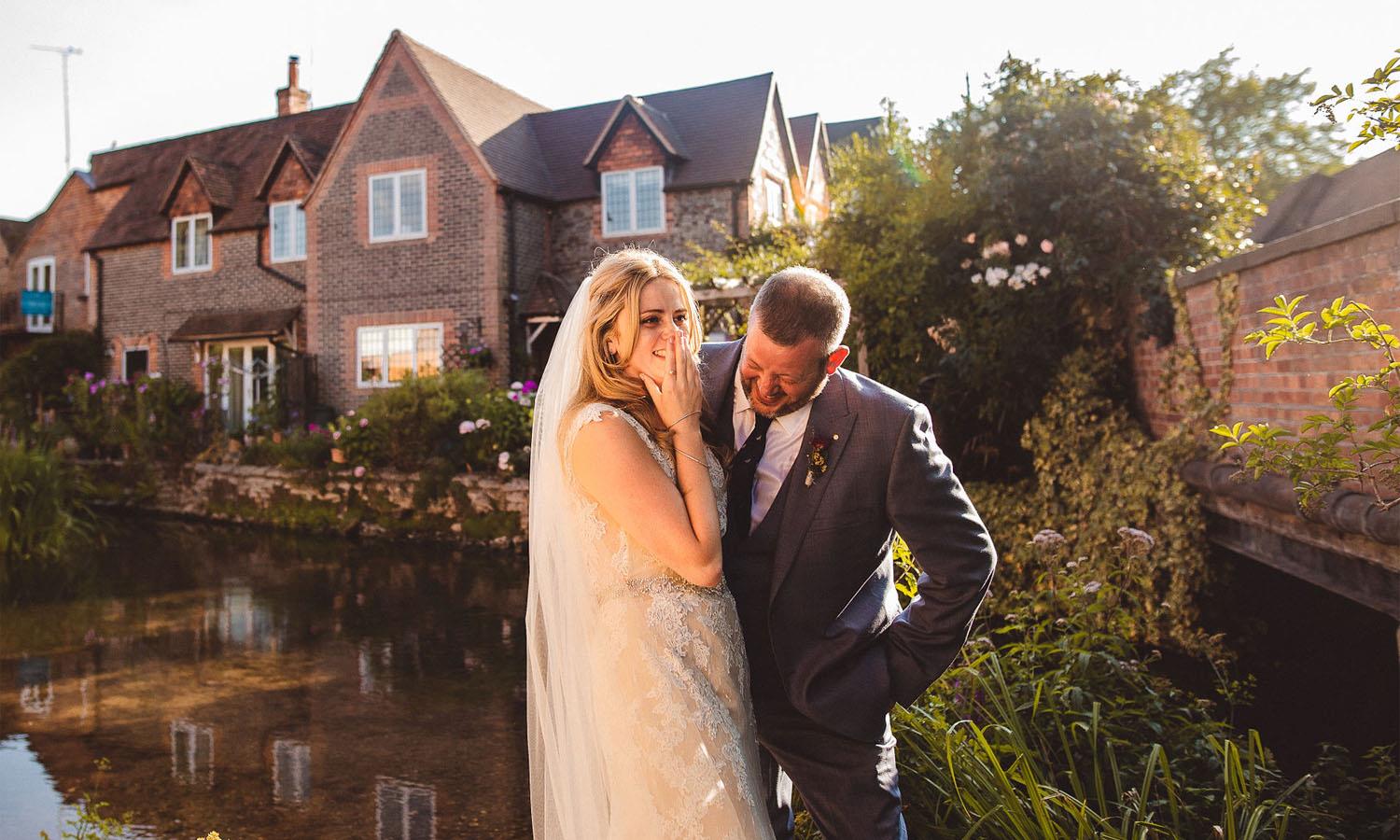 married couple by the thames at the Elephant Hotel in Pangbourne