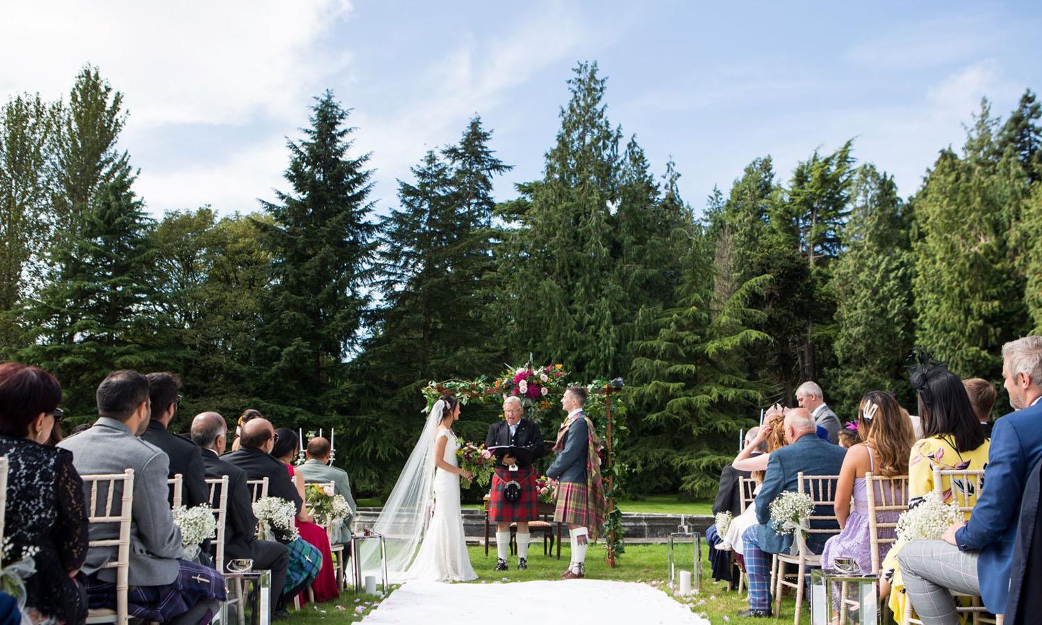 Couple getting married at Melville Castle
