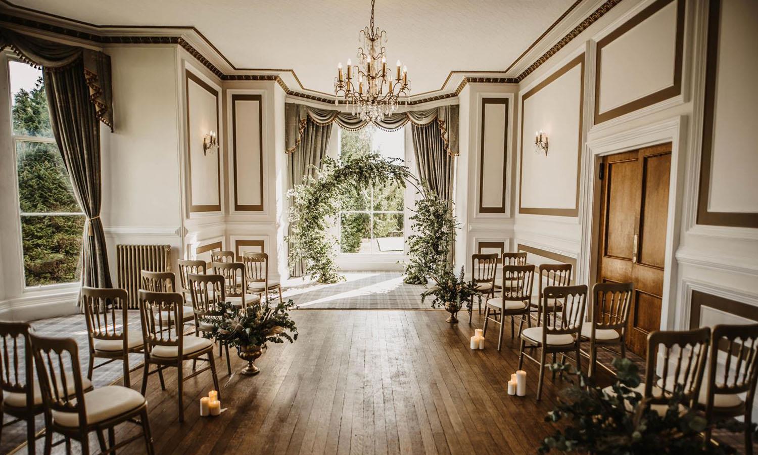 Spring-themed wedding ceremony room at Auchen Castle