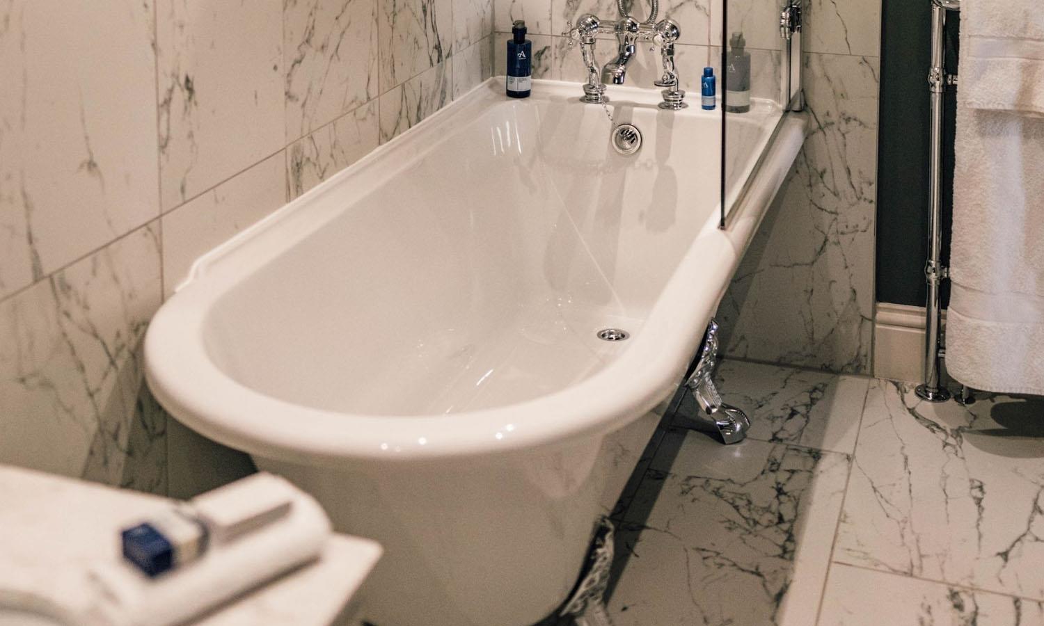 Bath tub in en-suite bathroom in Master Bedroom at Forss House