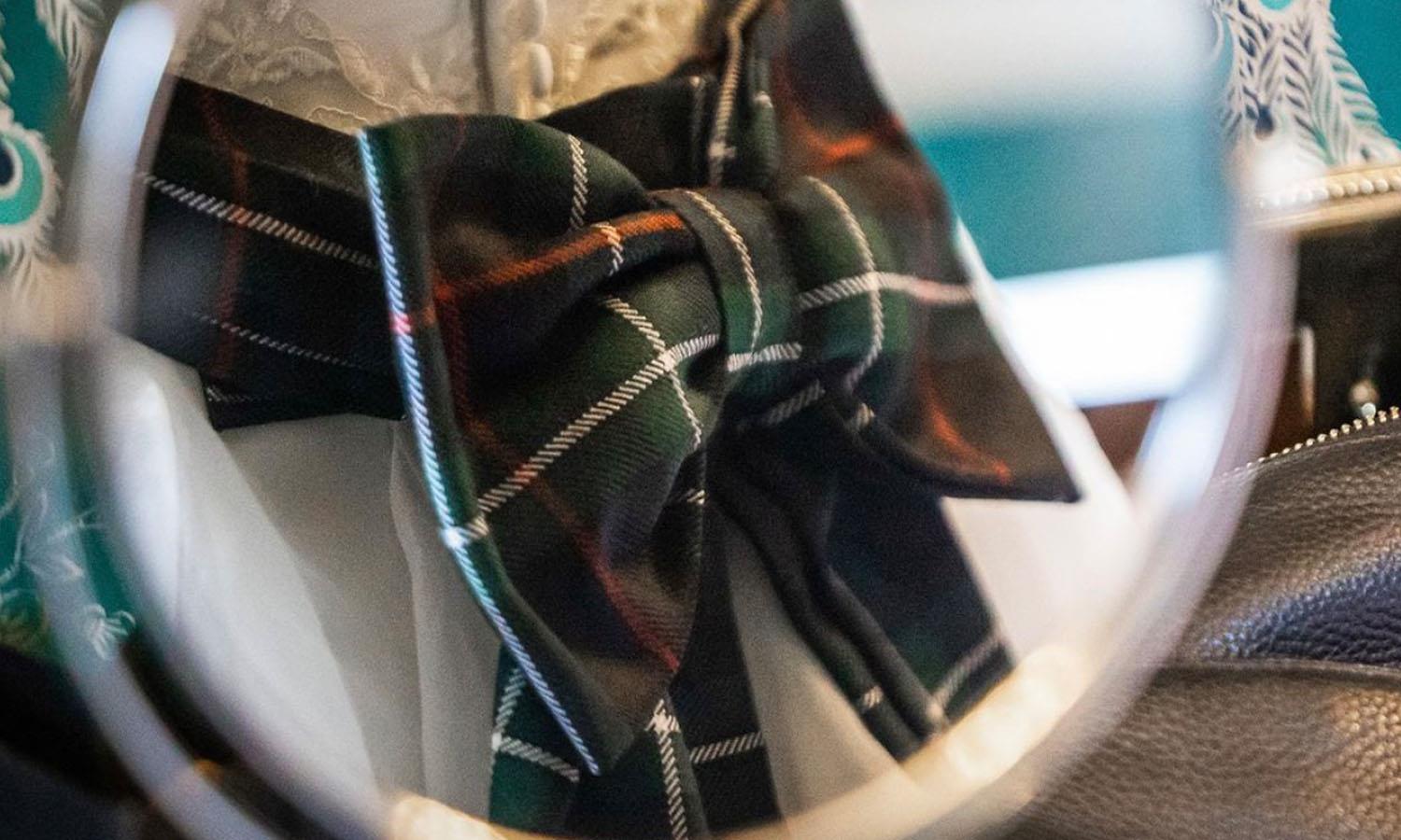 Tartan bow on the back of a wedding chair