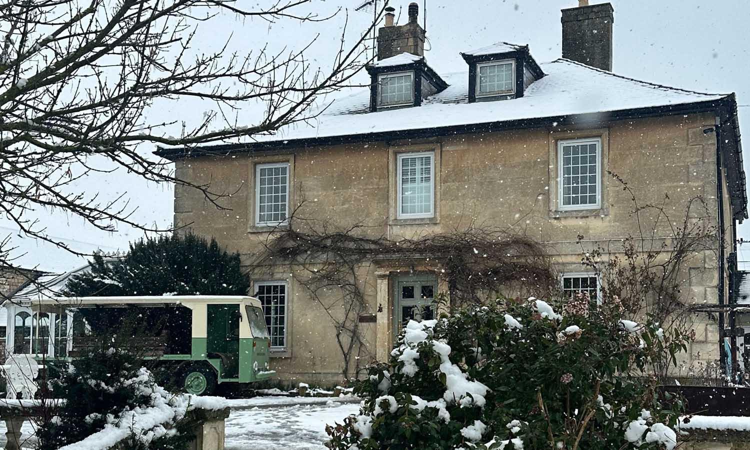 Front of Widrbook Hotel in winter with snow