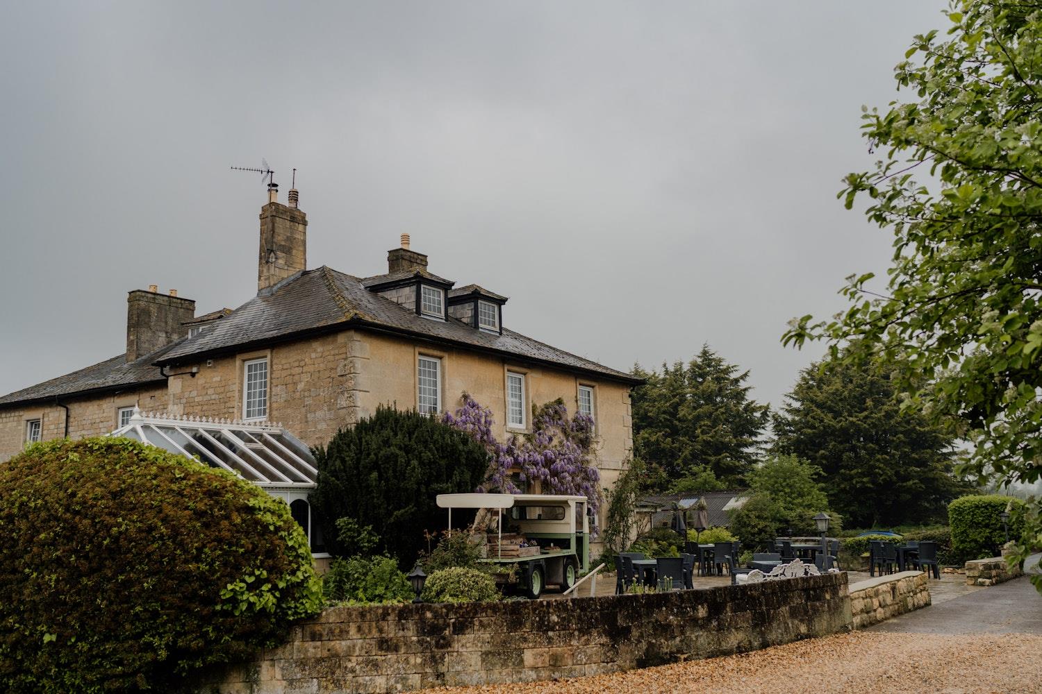 Widbrook Grange with wisteria in bloom (c) Ryan Goold
