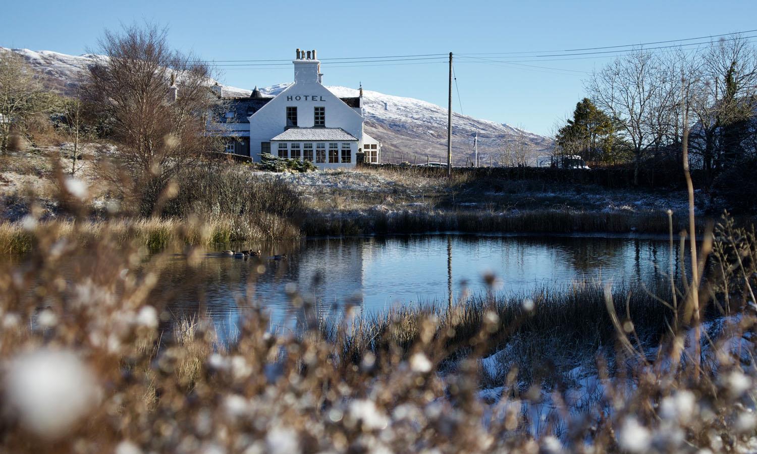 Eilean Iarmain in winter with snow on hills